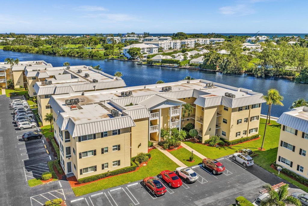 Photo of 3 Colonial Club Drive #102, Boynton Beach, FL 33435 (MLS # R11114574)
