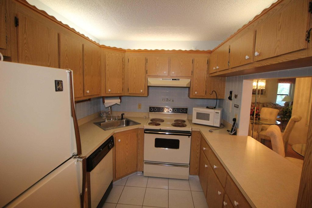 Photo of 805 Sky Pine Way #A2, Greenacres, FL 33415 (MLS # R11163673)