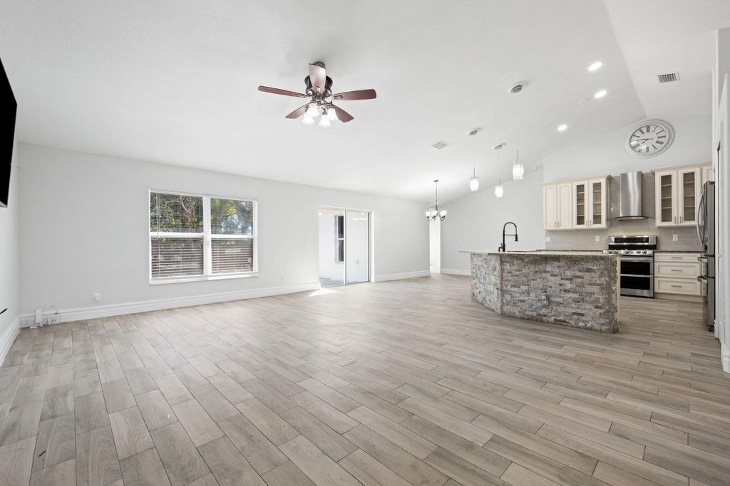 Photo of 572 SW Mccomb Avenue, Port Saint Lucie, FL 34953 (MLS # R11072751)