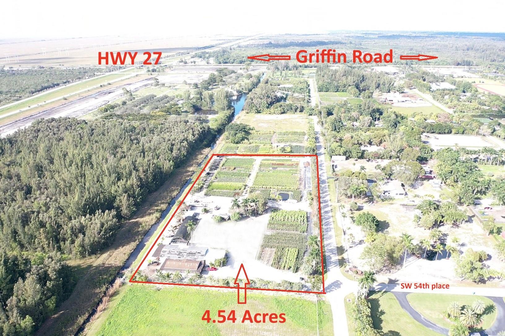 For sale or Lease! 4.75 acres with right of way. Legally filled (approx. 40,000 sq yards) with approved permits!!! Also unique to this area, one of the few properties with the wetlands mitigated, adding 1.68 plus acres of filled and compacted, land use to this property. Underground drainage was installed during the land fill process. This allows heavy equipment such as semi truck & trailers to move about the property. Well permit allows over 300,000 gallons a month draw. Comes with a 24x36 portable building and 80 x 40 utility building. Owner financing available.