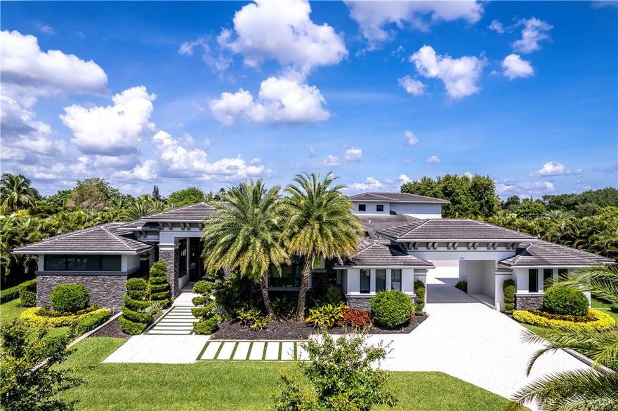 THIS IS IT! Plantation Acres most acclaimed home is for sale! This gated masterpiece is gorgeous on 57,000sqft of land on a quiet cul-de-sac street, with every bell and whistle for your family to enjoy. Within walking distance to The American Heritage School, 5 minutes from major highways, shopping and the FLA LIVE Arena. All en-suite bedrooms with built out walk-in closets, an owner’s suite suited for a king and queen. The gourmet kitchen has 4 ovens (including a steam oven) 2 oversized islands, automated cabinets & a walk-in-pantry with an appliance & charging station. 2 offices, an exceptional wine room, gym, loft/game room and a Dolby Atmos home theatre you need to hear to believe. Summer Kitchen & backyard pool experience is unmatched. Designer touches & lighting details throughout.