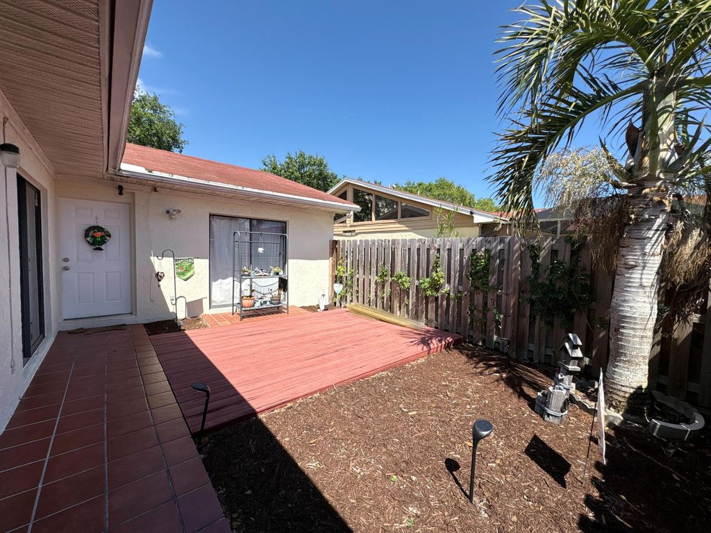 Photo of 4373 Woodstock Drive #D, West Palm Beach, FL 33409 (MLS # B26002328)