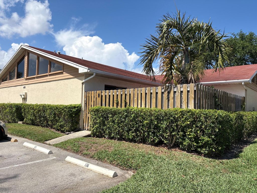 Photo of 4373 Woodstock Drive #D, West Palm Beach, FL 33409 (MLS # B26002328)