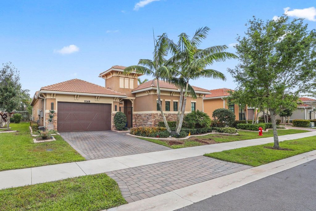 Photo of 9368 Cantal Circle E, Parkland, FL 33076 (MLS # B26011506)