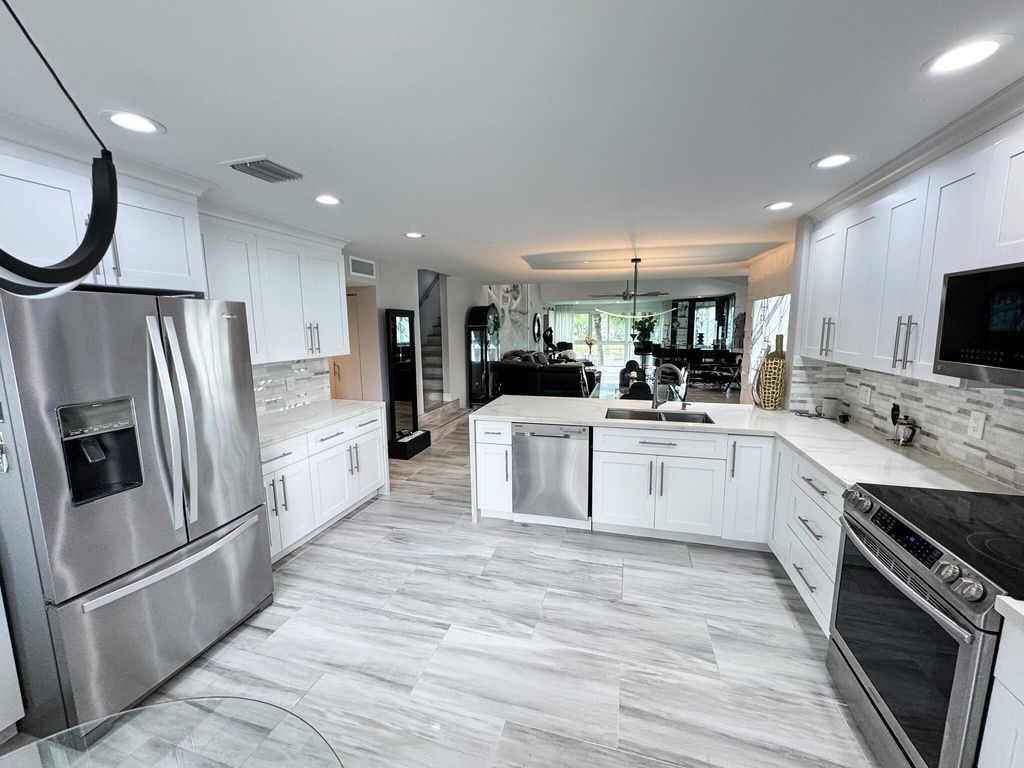 Photo of 7326 Clunie Place #13806, Delray Beach, FL 33446 (MLS # R11014122)