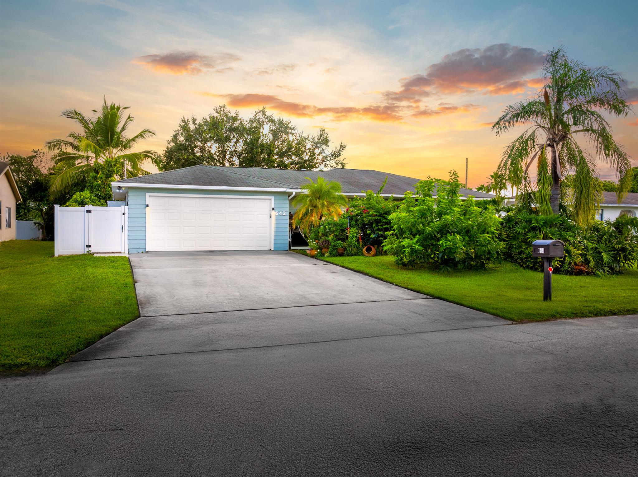 Welcome to this beautifully updated 2-bedroom, 2-bathroom home located in the heart of Port St. Lucie. Offering approximately 1,308 square feet of comfortable energy efficient living space, this property has been thoughtfully improved both inside and out. Recent upgrades include fresh exterior paint, paver installations on both sides of the home, fenced with an updated irrigation system to keep the lush landscaping thriving year-round. Inside, you'll find a spacious and well-appointed kitchen featuring granite countertops, stainless steel appliances, and an open layout that flows seamlessly into the main living area--ideal for everyday living or entertaining.