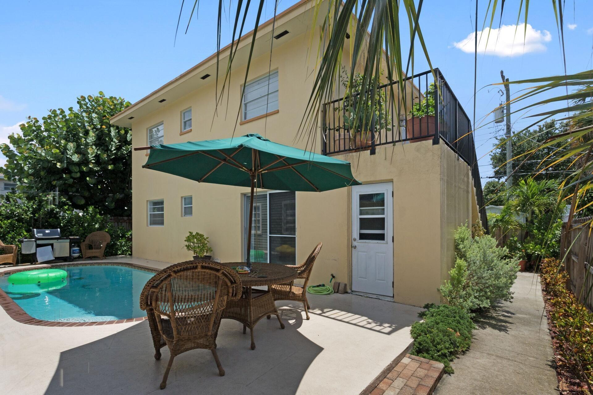 Completely remodeled with exquisite style. Gorgeous kitchen with 'leather' finish granite, stainless appliances,sublime white cabinets. Elegant bathroom with beadboard wall and dark wood vanity. Porcelain Turtles in Pool. A safe secluded compound completely fenced. Private laundry, cool ceramic tile floors, gorgeous view of the pool through double sliders. Only 2 blocks to Intracoastal Waterway, sands and turquoise waters of Lake Worth Beach. Bohemian charm, sidewalk cafe's, festivals, only steps to Lake Avenue. Perfect location; walk to cafes, nightclubs, art galleries, shopping, boating, beach activities. Upscale neighborhood.Mere feet from the best amenities! It's time: leave the stress, come decompress, LOVE WHERE YOU LIVE!