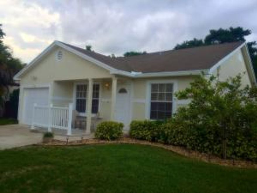 Beautiful West Boca home just waiting for you! The low HOA and great schools make this lovely 3 bedroom 2 bath very desirable. The highlighted features include: Hurricane impact windows, AC was replaced in 2014, the roof is about 8 years old, tankless water heater added in 2014, guest bath is remodeled, crown molding, vaulted ceilings, knock down ceilings, plantation shutters, the home has been freshly painted AND it sits on a large lot! The community pool is just a short walk away. The home offers room for a pool and the back yard is private with no rear neighbors.