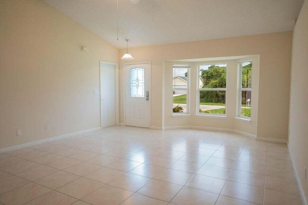 Photo of 1682 SW Glacador Avenue, Port Saint Lucie, FL 34953 (MLS # B26017297)