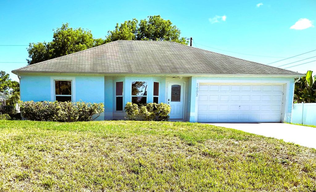 Photo of 1682 SW Glacador Avenue, Port Saint Lucie, FL 34953 (MLS # B26017297)