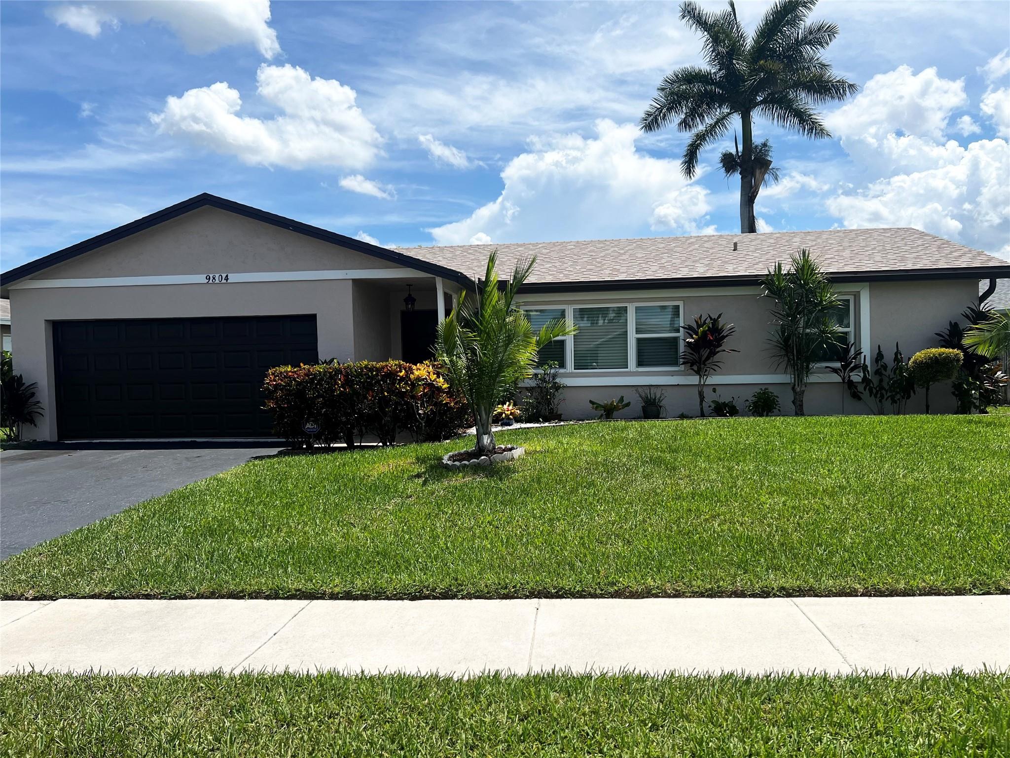 Spacious & Updated 4-Bedroom in Hills of Welleby Beautifully maintained home offering over 2,000 sq ft in a desirable, well-kept community with low HOA fees. Major upgrades include a 2024 A/C, 2023 roof, contemporary impact front door (2023), impact doors and windows, and a 2023 garage door opener. Interior highlights feature vaulted ceilings, a skylight, remodeled kitchen and bath, walk-in closets in 3 of the 4 bedrooms, French doors off the family room leading to a screened patio and 7 ceiling fans. Outside, enjoy lush landscaping, fruit trees, flowering foliage, a sprinkler system, and a spacious backyard—perfect for relaxing or entertaining. Excellent location close to schools, parks, and shopping.