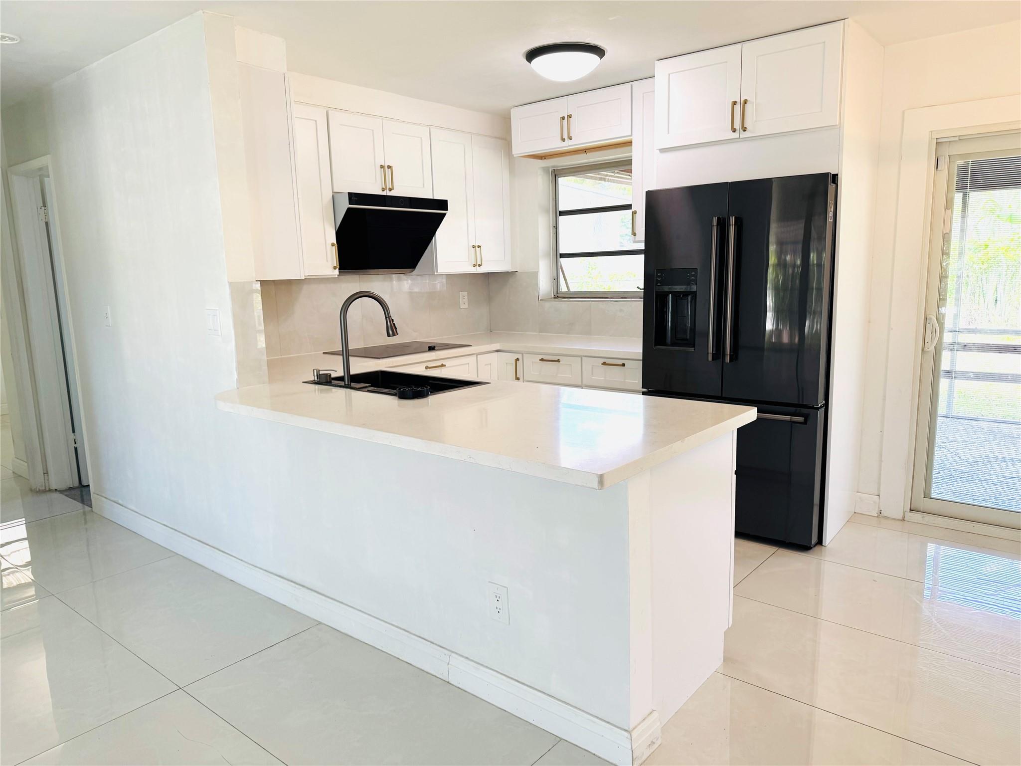 Great starter home in a beautiful maintained Margate neighborhood. This is a perfect place to relax and enjoy the Floridian lifestyle. This property is situated on a large corner lot with mature trees, fruit trees and plenty of shade. You'll love spending time in the backyard! There's plenty of room to bring your boat, RV, other toys and more. Newly added gorgeous bathroom and also newer electrical panel. NO HOA!!!!