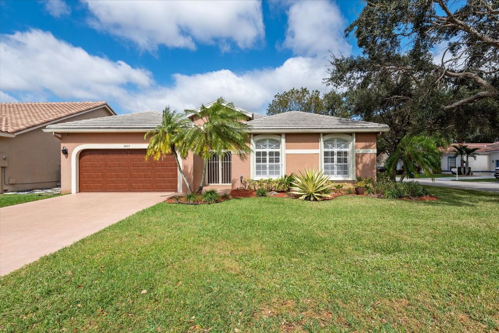 Photo of 5877 NW 73rd Court, Parkland, FL 33067 (MLS # F10422158)