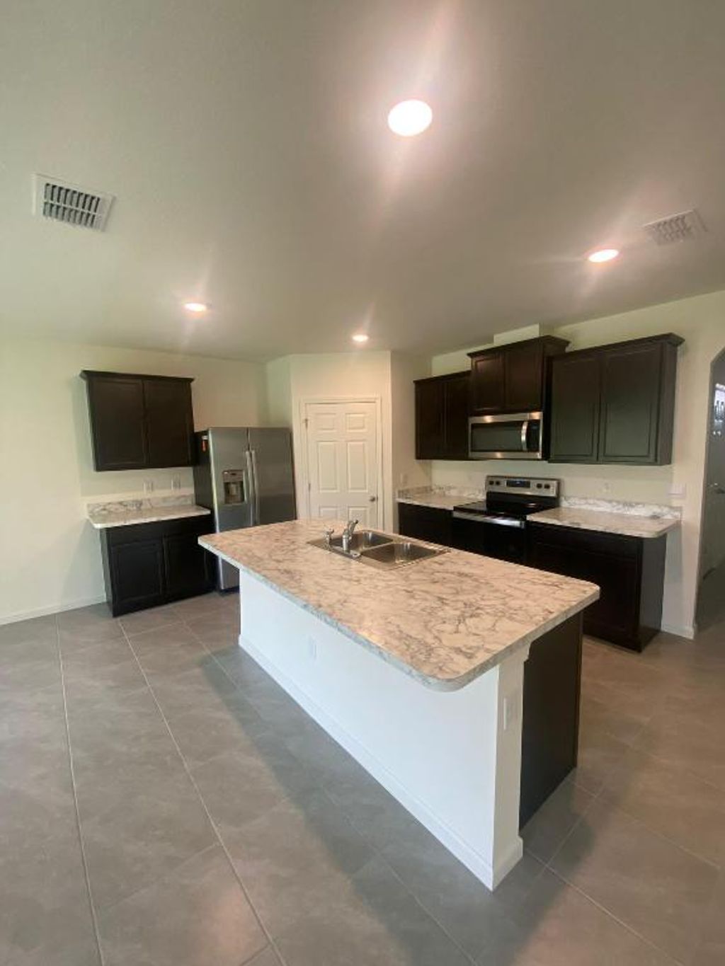 Photo of 1314 SW Goodman Avenue, Port Saint Lucie, FL 34953 (MLS # R10959242)