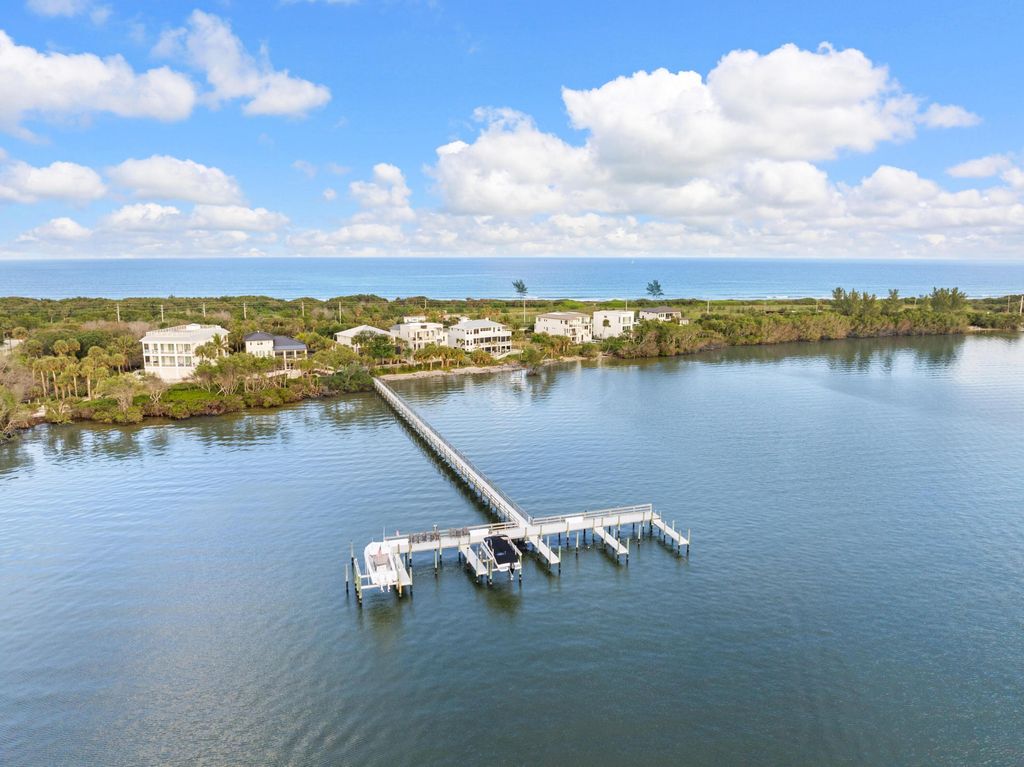 Photo of 7671 Pelican Pointe Drive, Jensen Beach, FL 34957 (MLS # R11055371)