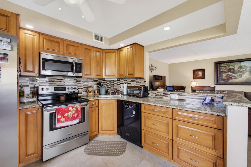 Photo of 101 Wellington C, West Palm Beach, FL 33417 (MLS # B26053573)