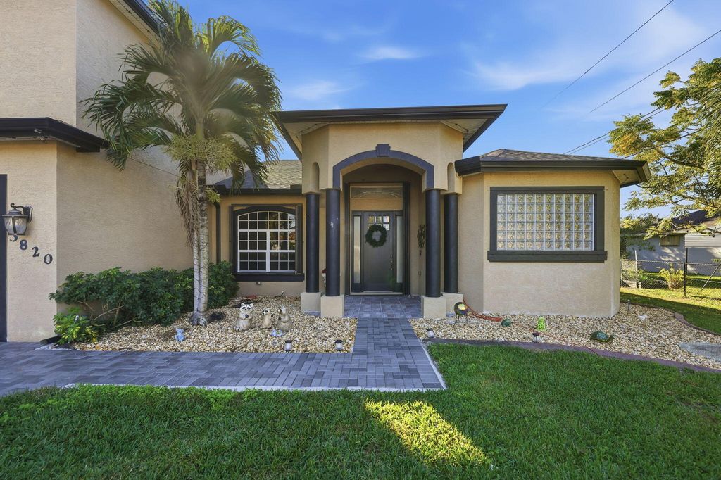 Photo of 3820 SW Cheribon Street, Port Saint Lucie, FL 34953 (MLS # R11155757)