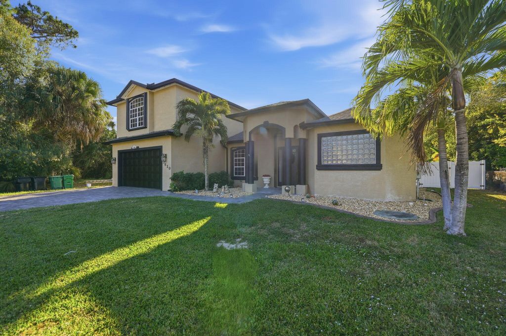 Photo of 3820 SW Cheribon Street, Port Saint Lucie, FL 34953 (MLS # R11155757)