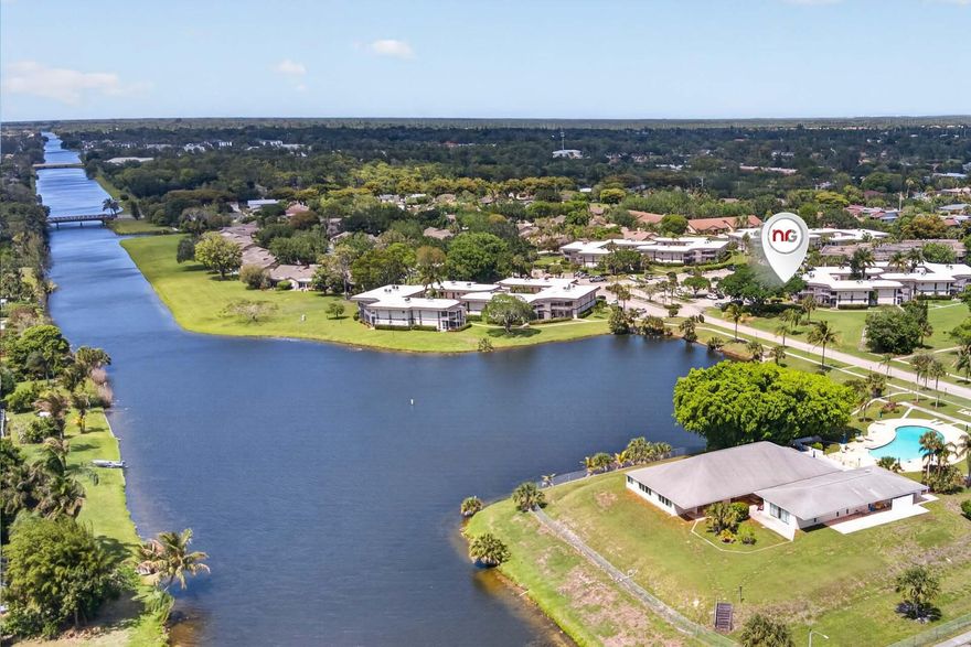 Welcome to your tranquil Florida retreat! This light-filled second-floor residence showcases beautiful lake views and a peaceful setting within a desitrable senior community. Offering 2 bedrooms and 2 bathrooms, it's ready for your personal touch. Recent updates include a new A/C in 2025 and a roof replacement in 2024. Additional storage space. Enjoy a spacious balcony with access from both the living area and bedroom, perfect for unwinding while taking in the serene surroundings. Ideally positioned just across from the lake and a short walk to the community pool. Greenway Village is conveniently located within a short drive to a variety of nature, cultural, and entertainment options.