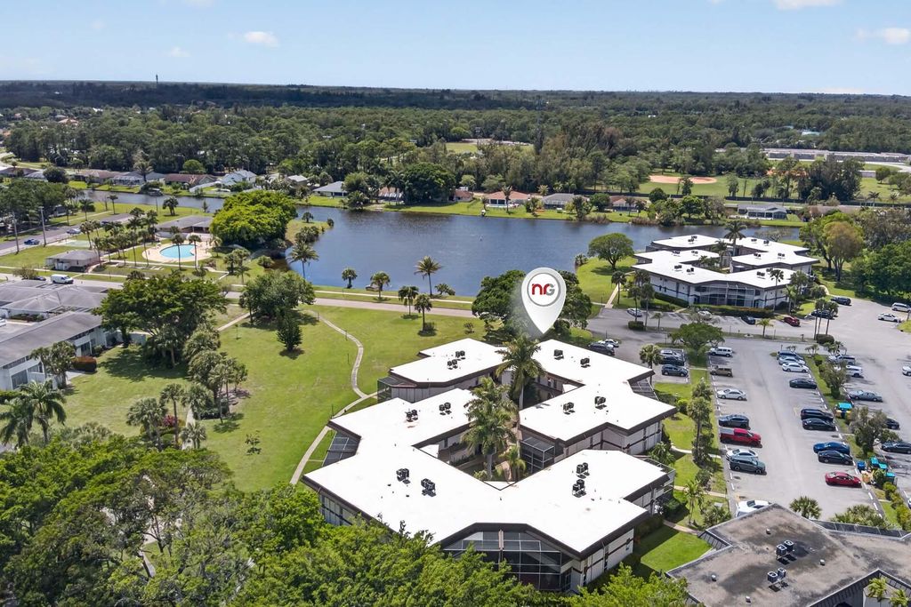 Photo of 3 Greenway Vlg Vlg N #210, Royal Palm Beach, FL 33411 (MLS # B26020100)