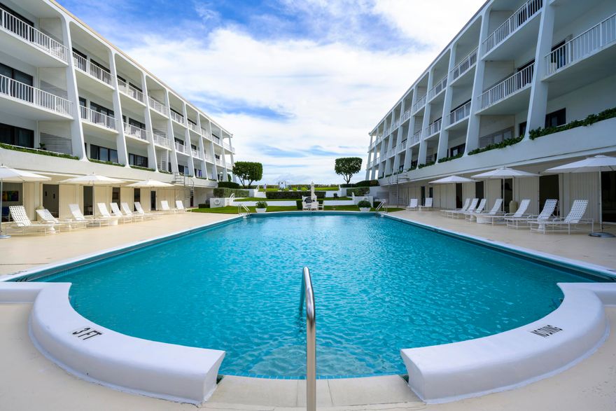 Completely renovated 2BR/2BA garden apartment in The Reef that truly lives like a private beach house, offering direct access to the pool and beach. This desirable split floor plan features light-filled living spaces, with the living room and both bedrooms opening to the expansive covered lanai, perfect for private outdoor dining, entertaining or relaxing to ocean breezes. Thoughtfully updated with quality finishes throughout, the residence combines comfort and coastal style. The pet-friendly building offers a doorman, on-site manager, and garage parking. Ideally located adjacent to Phipps Ocean Park, Palm Beach Tennis Center, close to the Raymond Floyd Par 3 Golf Course and dining, and just minutes to Worth Avenue, fine dining, and Palm Beach International Airport.