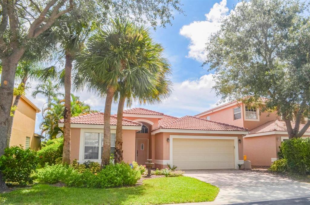 Beautiful one story renovated single family home with amazing lake views located in a GL built gated community just east of 441. Kitchen includes beautiful quartz countertops, Bianco quarzite sink with filtration system & extra high antique white cabinets accented by newer sleek black stainless steel appliances. Cabinets & drawers all have soft closing. Double trash bin drawer is perfect for your garbage & recyclables. Eat-in kitchen or bar area is perfect! Stunning 24 inch porcelein tile floors laid on a diagonal are throughout the main living areas. Very light bright feel is created by the vaulted ceilings and flow of the house. Master bedroom has tray ceilings and has a gorgeous view of the lake!Newly renovated clubhouse offers tennis, community pool & party room. Close to shopping!