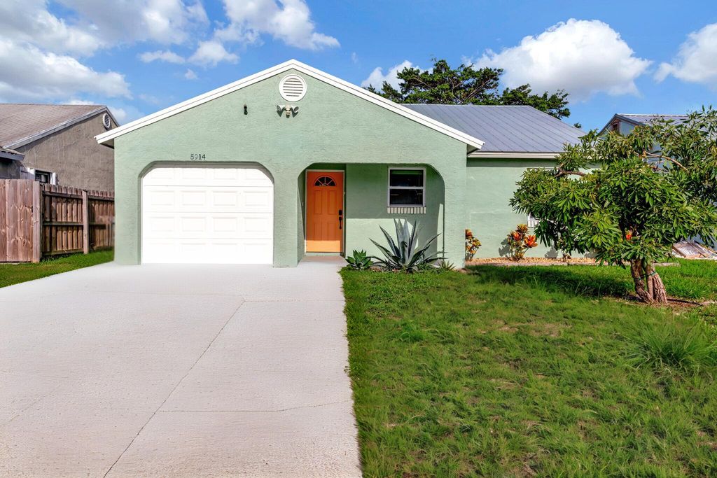 Photo of 5914 SE Mitzi Lane, Stuart, FL 34997 (MLS # R11001766)