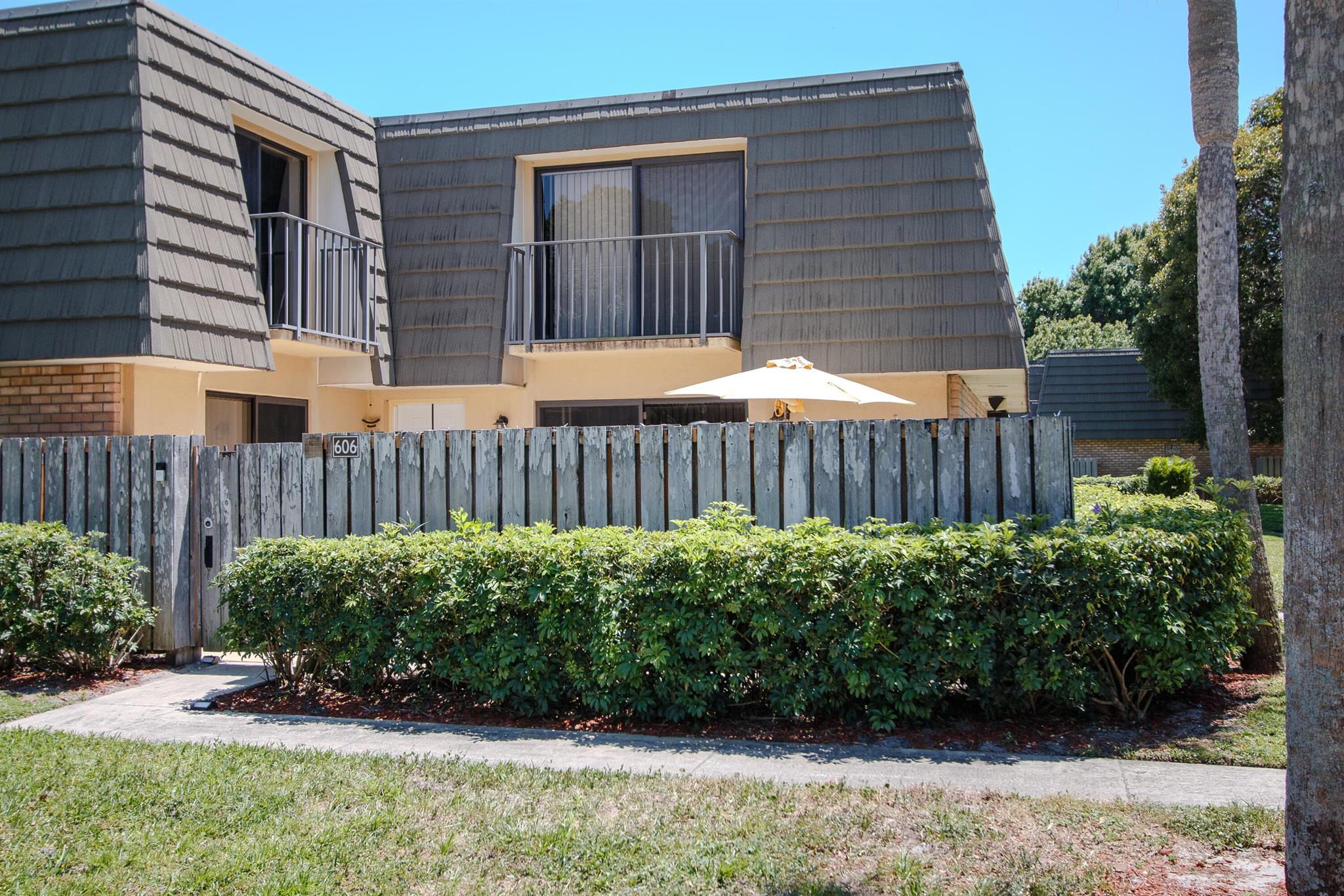 Move-In Ready Townhouse with Modern Upgrades. Water, cable and internet included . Great family community, All new Patio furniture stays. This beautifully remodeled townhouse is packed with recent upgrades and ready. Enjoy a fully renovated kitchen and bathrooms, featuring new ceramic tile flooring in bath, updated toilets, and a double vanity in the master bath. The home includes new appliances washer & dryer, refrigerator, microwave, electric stove and dishwasher--all less than 6 months old. Additional highlights: Freshly painted interior, New flooring on stairs and in bathroomsElectric panel (2019),AC system (2019), New front door.