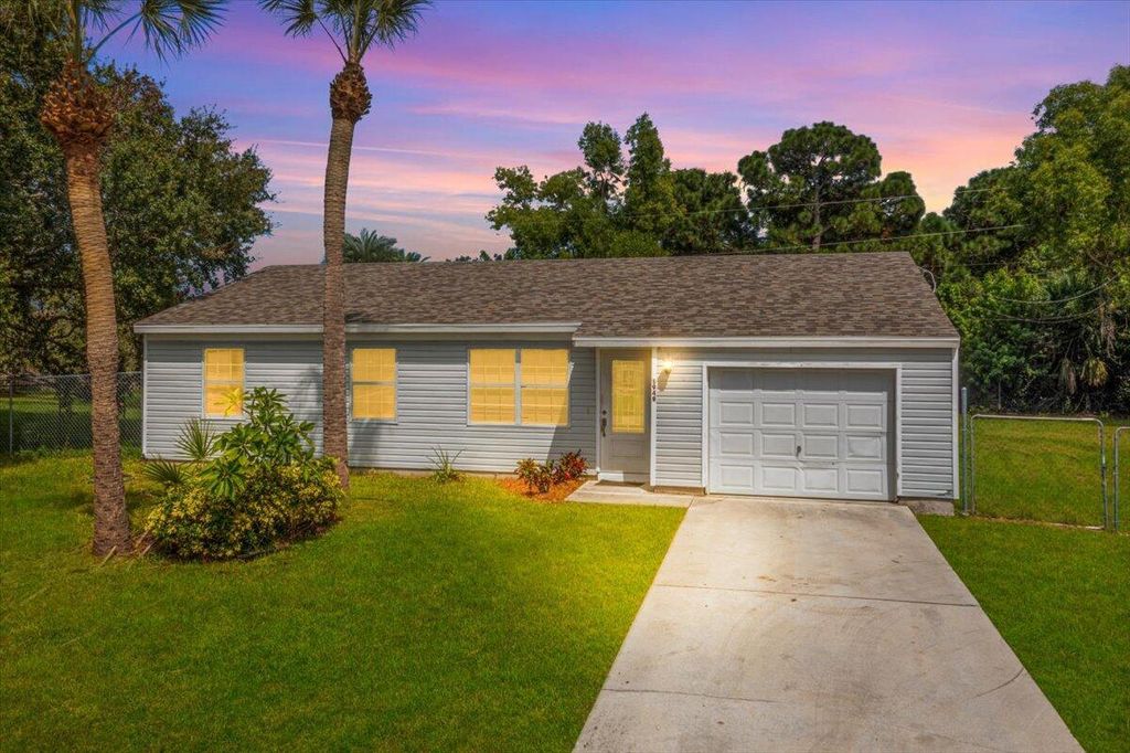 Photo of 1949 SE Mandrake Circle, Port Saint Lucie, FL 34952 (MLS # R11024347)