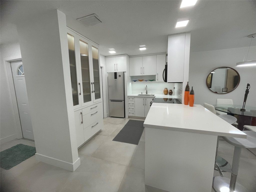 Photo of 604 NE 2nd St #117, Dania Beach, FL 33004 (MLS # F10533105)
