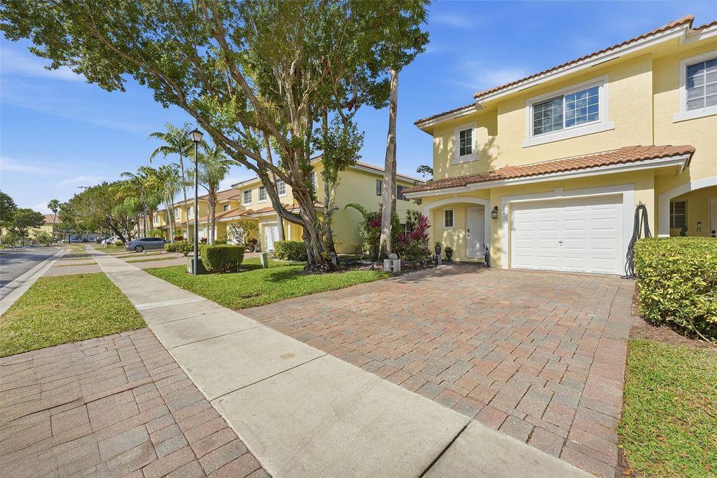 Photo of 1174 Imperial Lake Road, West Palm Beach, FL 33413 (MLS # F10551480)