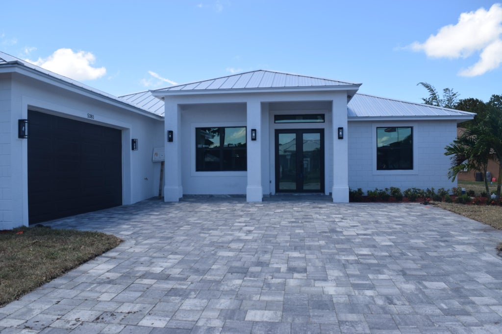 Photo of 5381 NW Dell Court, Port Saint Lucie, FL 34986 (MLS # R10990164)