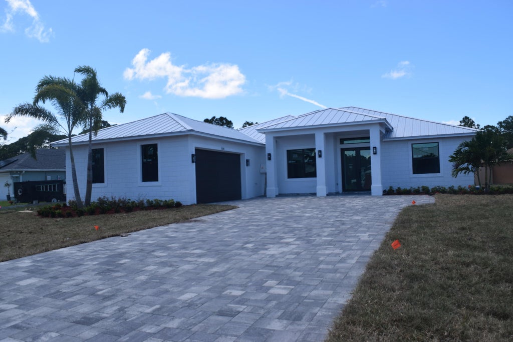 Photo of 5381 NW Dell Court, Port Saint Lucie, FL 34986 (MLS # R10990164)