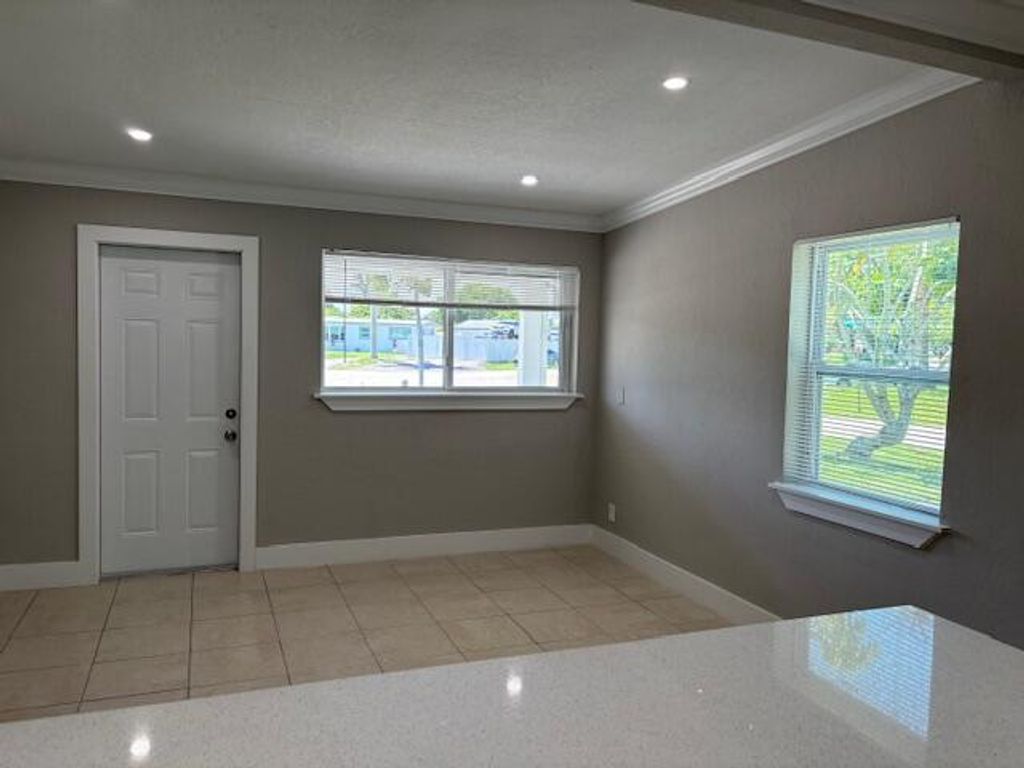 Photo of 5580 Honeysuckle Drive, West Palm Beach, FL 33415 (MLS # R11138445)