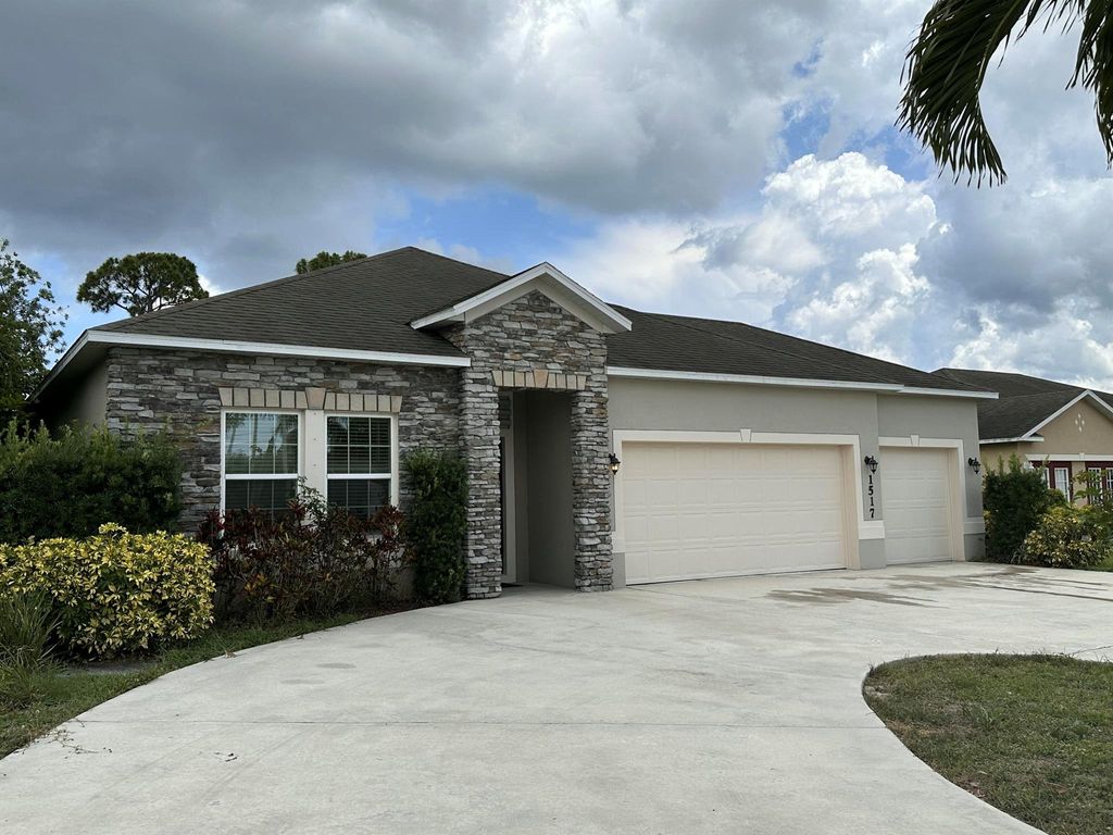 Photo of 1517 SW Bayshore Boulevard, Port Saint Lucie, FL 34983 (MLS # R11095061)