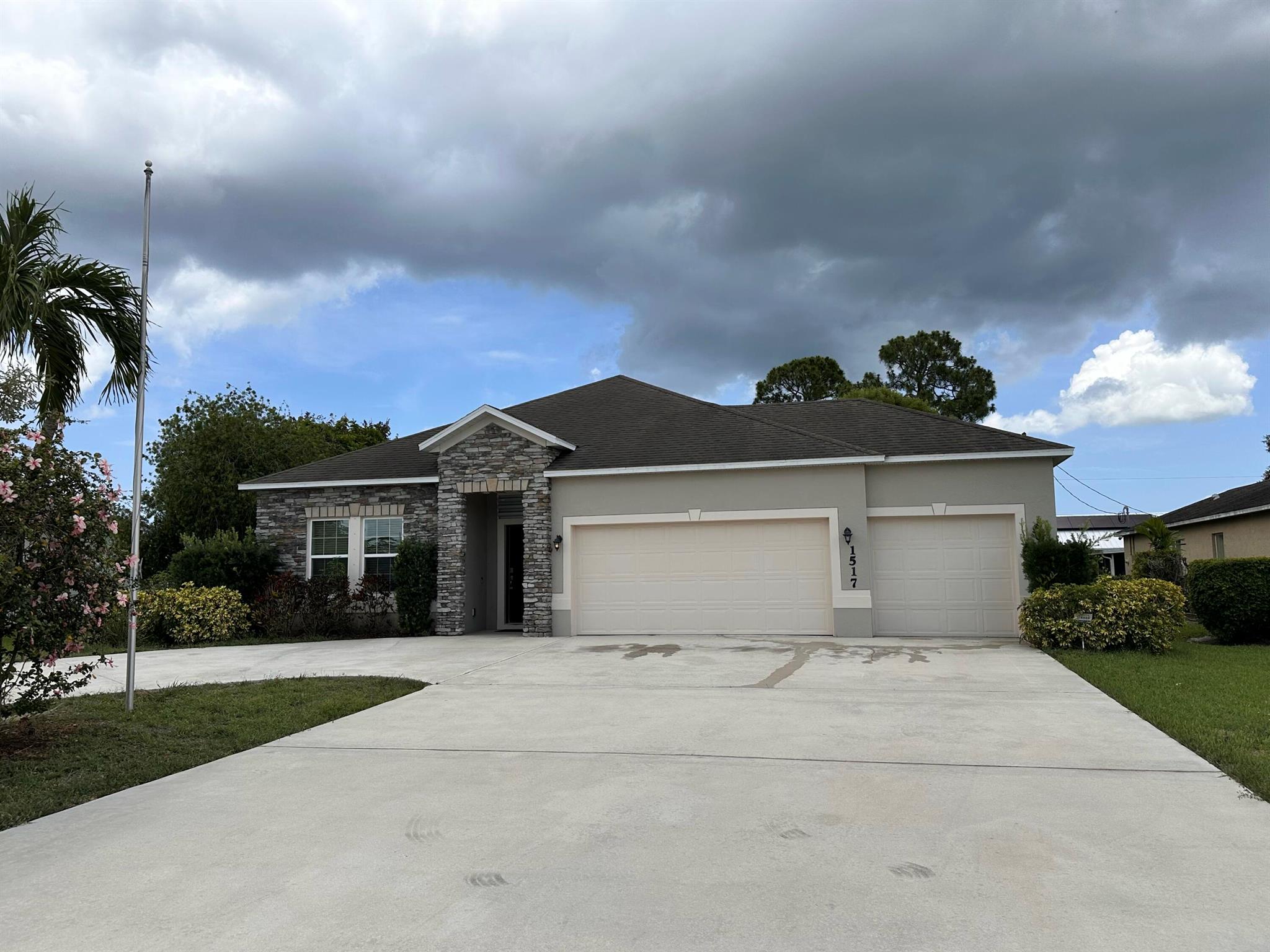 Welcome to this stunning 4-bedroom, 2-bathroom model home with screened patio and lake view. This home features an inviting circular driveway with a thoughtfully designed layout. The open-concept kitchen boasts granite countertops, stainless steel appliances, and ample cabinet space--perfect for cooking and entertaining. Enjoy the convenience of a dedicated office located in the garage, ideal for working from home. Additional highlights include a spacious air conditioned garage, modern finishes, and a comfortable living area designed for family living. Don't miss this move in ready gem!