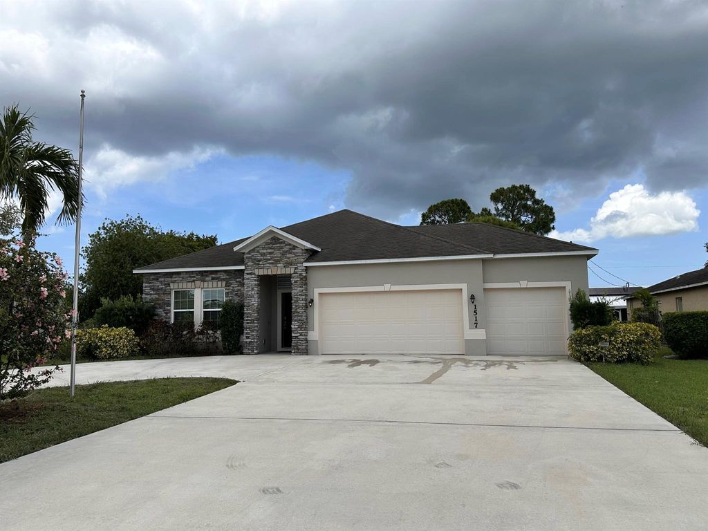 Photo of 1517 SW Bayshore Boulevard, Port Saint Lucie, FL 34983 (MLS # R11095061)