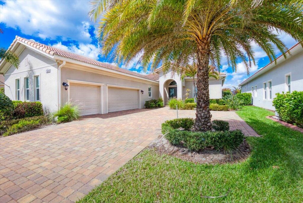 Photo of 9116 SW Pepoli Way, Port Saint Lucie, FL 34987 (MLS # B26005835)