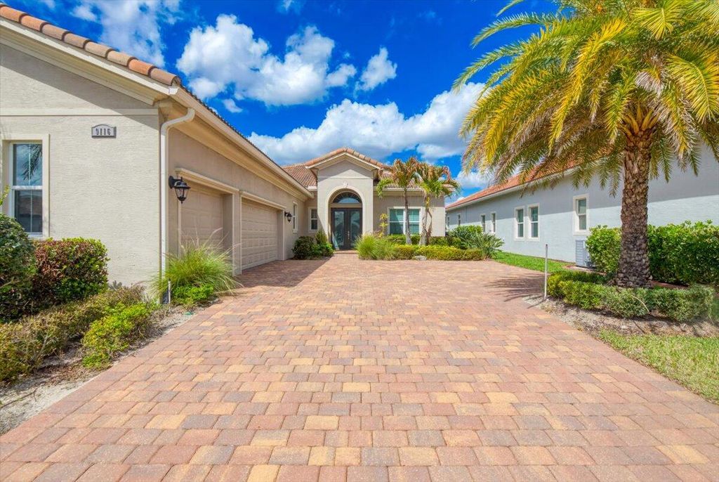 Photo of 9116 SW Pepoli Way, Port Saint Lucie, FL 34987 (MLS # B26005835)