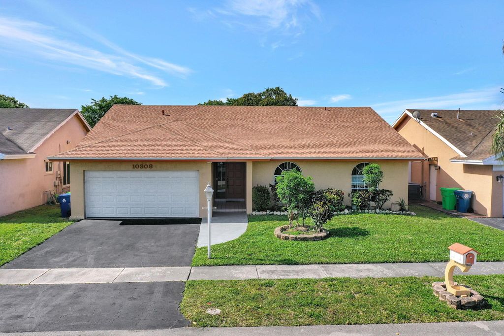 Photo of 10308 Welleby Isles Lane, Sunrise, FL 33351 (MLS # B26016440)