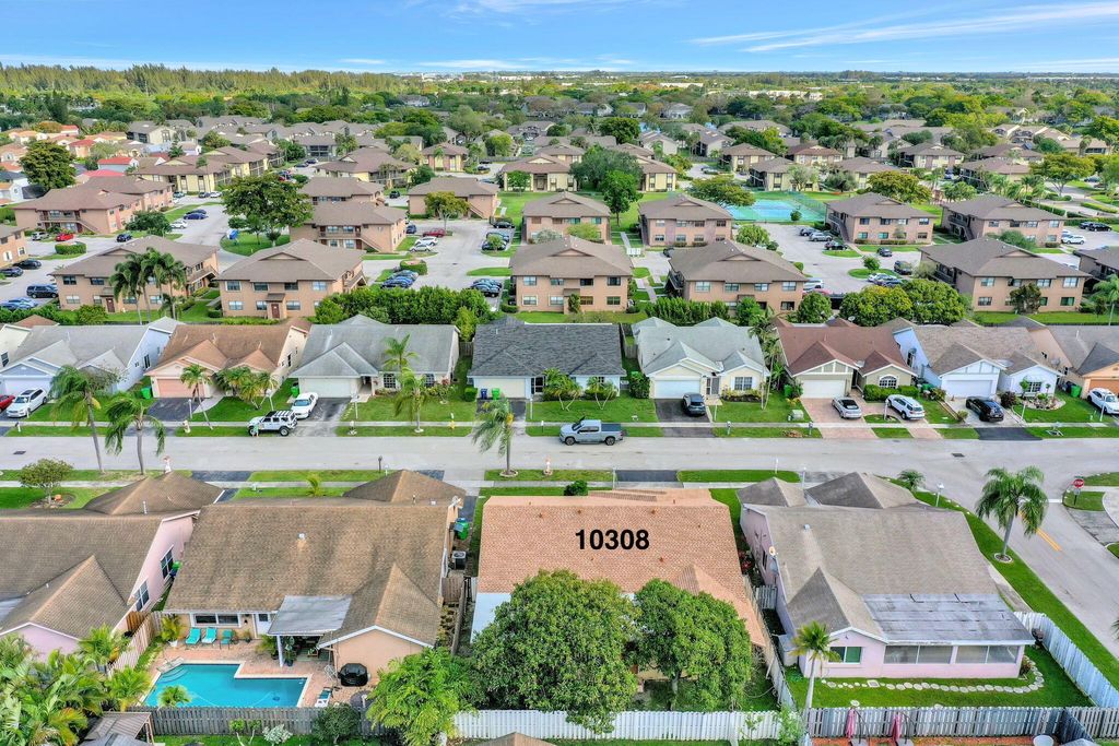 Photo of 10308 Welleby Isles Lane, Sunrise, FL 33351 (MLS # B26016440)