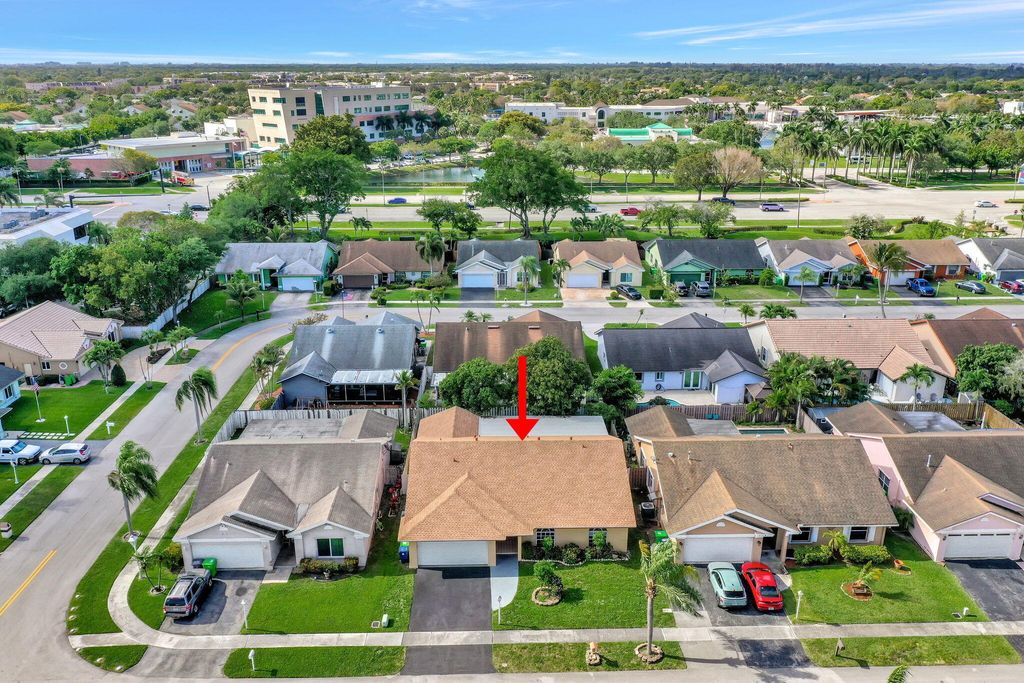 Photo of 10308 Welleby Isles Lane, Sunrise, FL 33351 (MLS # B26016440)