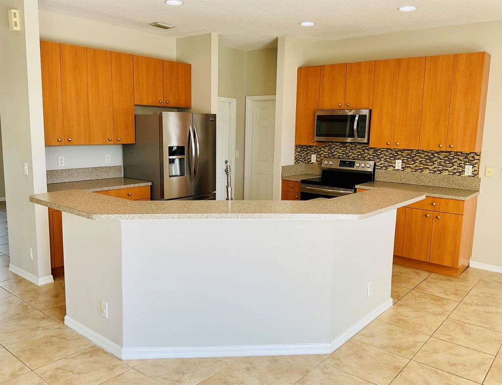 Photo of 165 NW Carmelite Street, Port Saint Lucie, FL 34983 (MLS # R10984946)