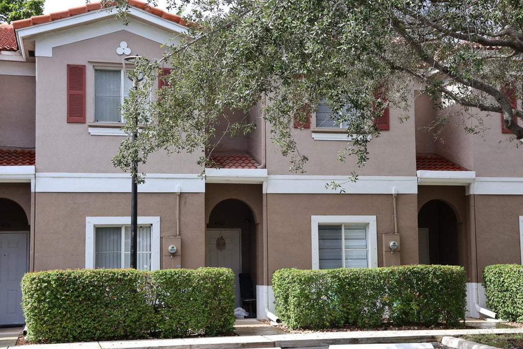 Photo of 4410 WOODLAND Circle, Tamarac, FL 33319 (MLS # B26092610)