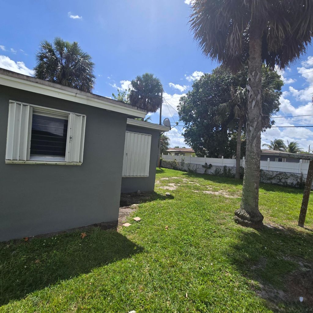 Photo of 3860 NW 8th Place, Fort Lauderdale, FL 33311 (MLS # B26018842)