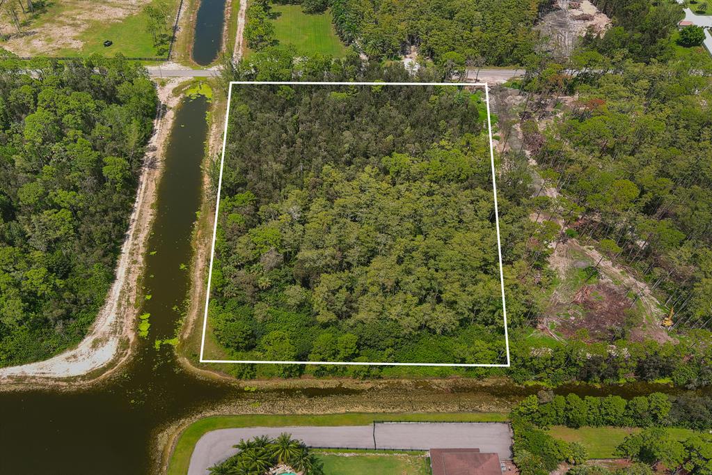 Prime 5-acre lot on water in the upscale community of Homeland. Make your dream a reality by building an equestrian estate. Plenty of room to accommodate your vision of luxury for horse stables, paddocks, jumping ring and more. This gated, established, equestrian community has 20 miles of riding trails and just minutes away from Wellington's equestrian venues, A- rated schools, shopping, fine dining and easy access to major highways and airports.