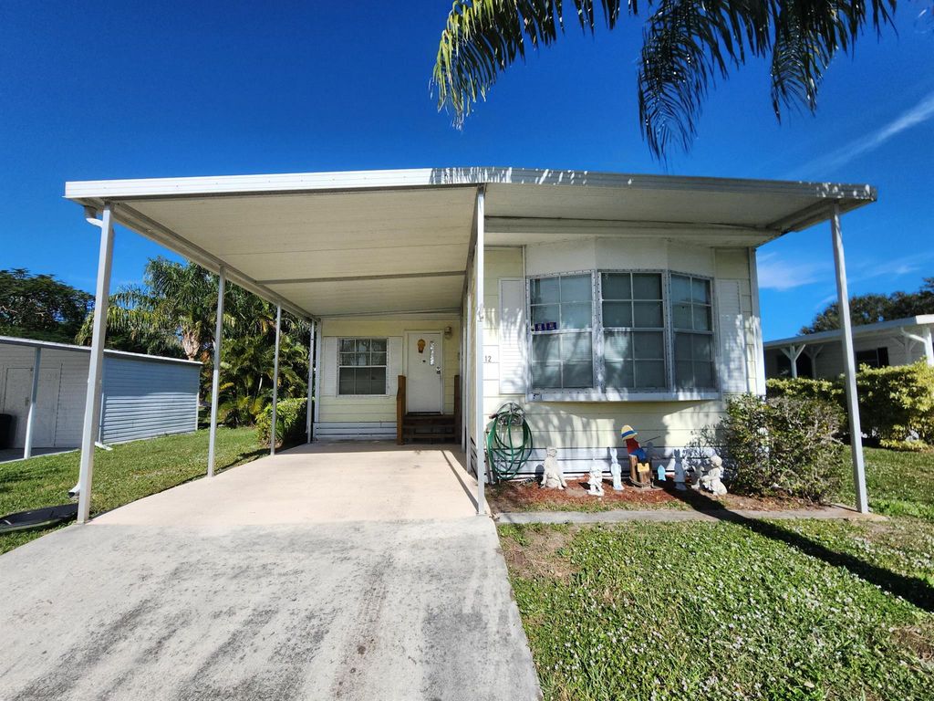 Photo of 12 San Marino Way, Port Saint Lucie, FL 34952 (MLS # R11046639)