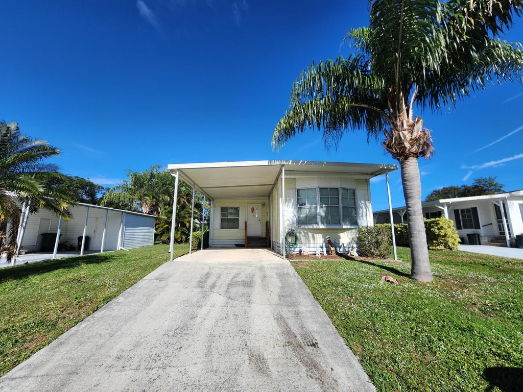 Photo of 12 San Marino Way, Port Saint Lucie, FL 34952 (MLS # R11046639)