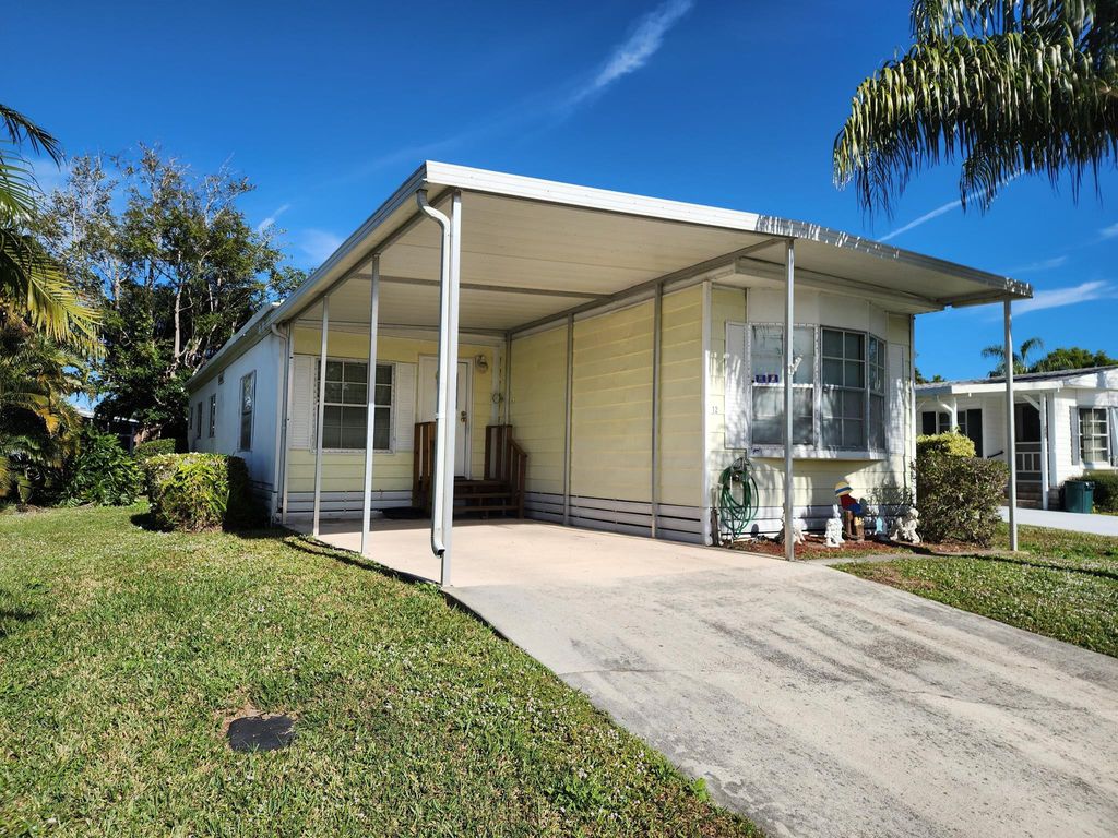 Photo of 12 San Marino Way, Port Saint Lucie, FL 34952 (MLS # R11046639)