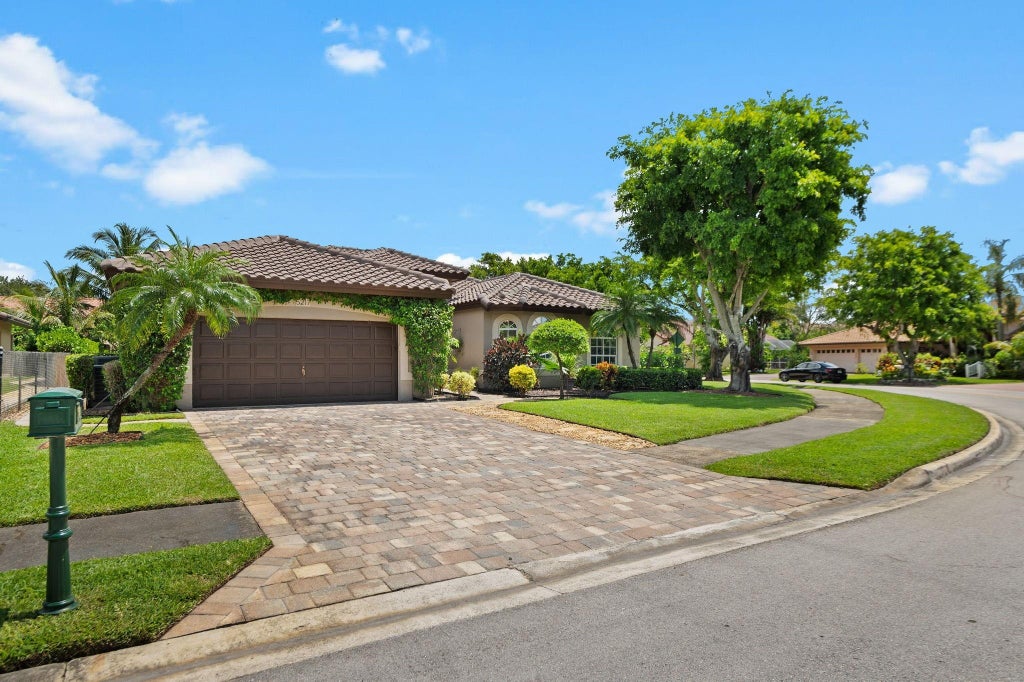 Photo of 5217 NW 109th Lane, Coral Springs, FL 33076 (MLS # F10515999)